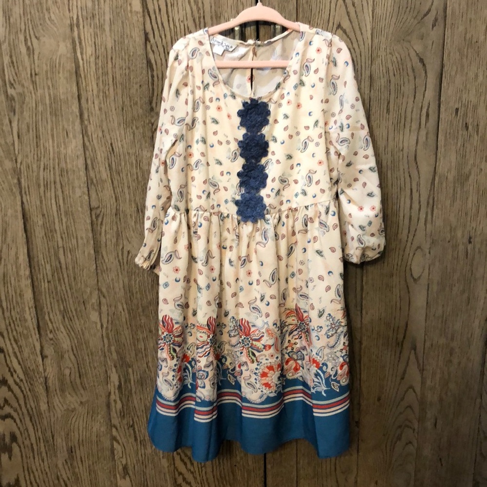 Pippa & Julie Dress in size 7. 3/4 sleeve length